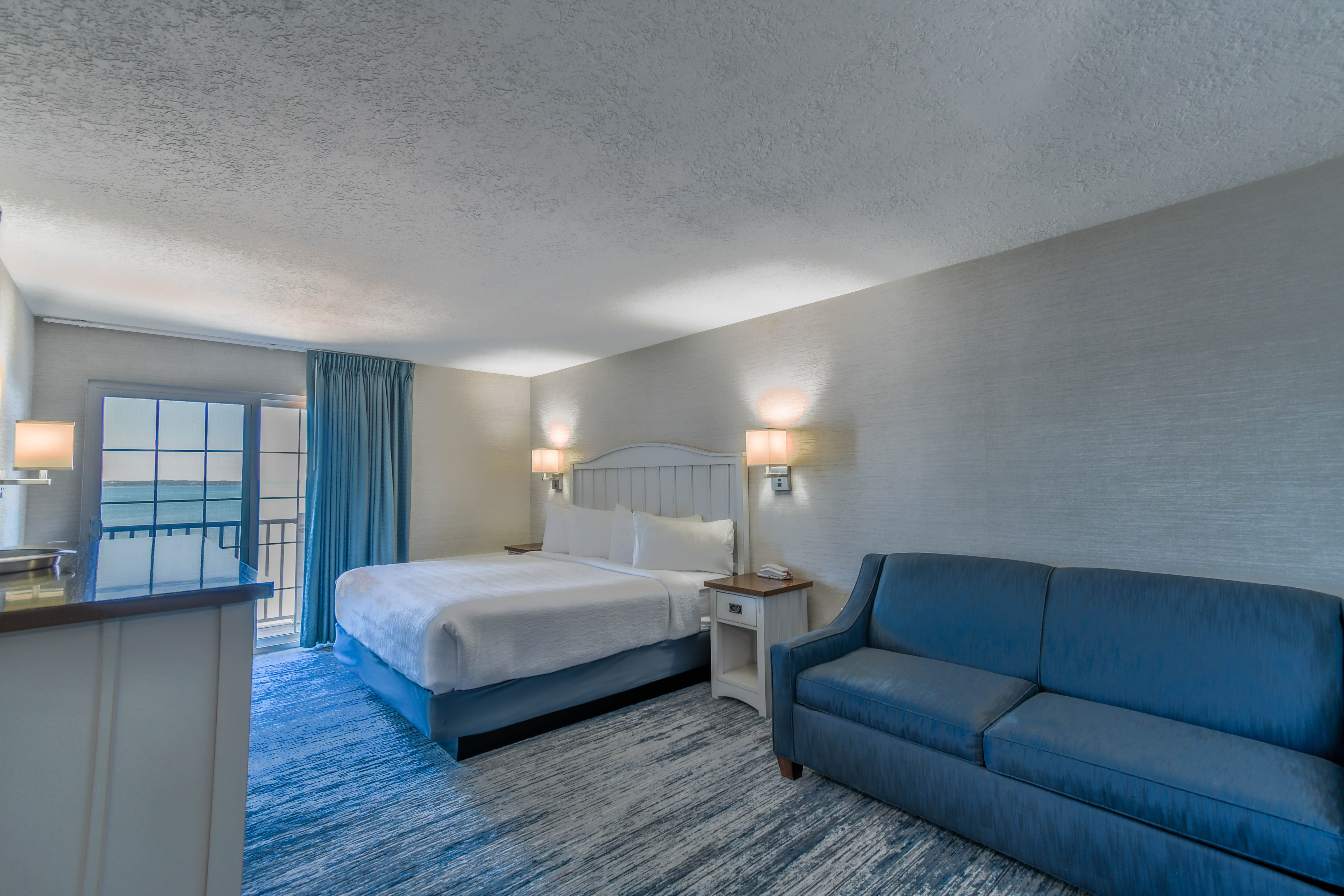a room with a bed and a couch