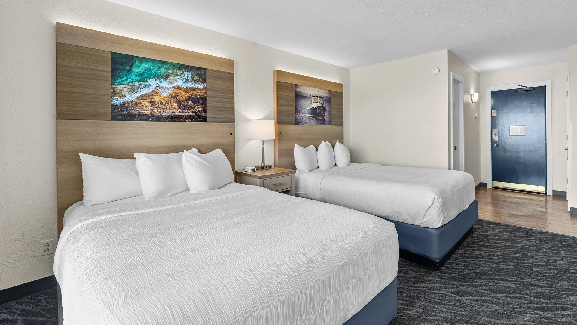 a hotel room with two beds