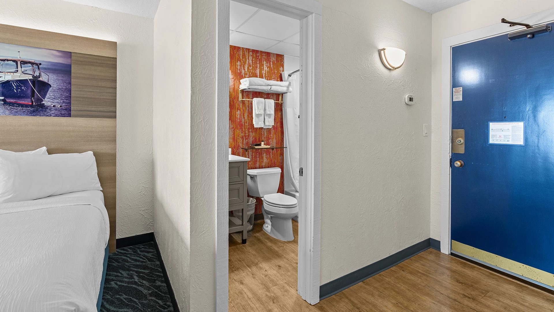 a bathroom with a toilet and sink