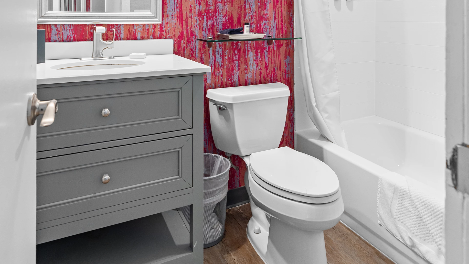 a bathroom with a sink and toilet