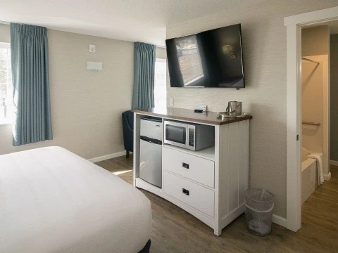 a room with a tv and a table