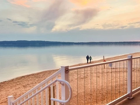 a couple walking on a beach