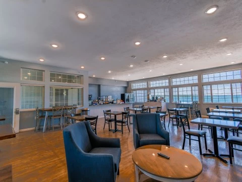 a room with tables and chairs