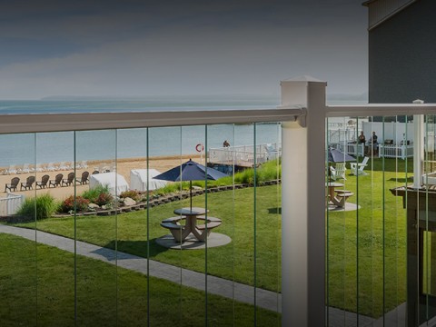 a view of a beach from a balcony