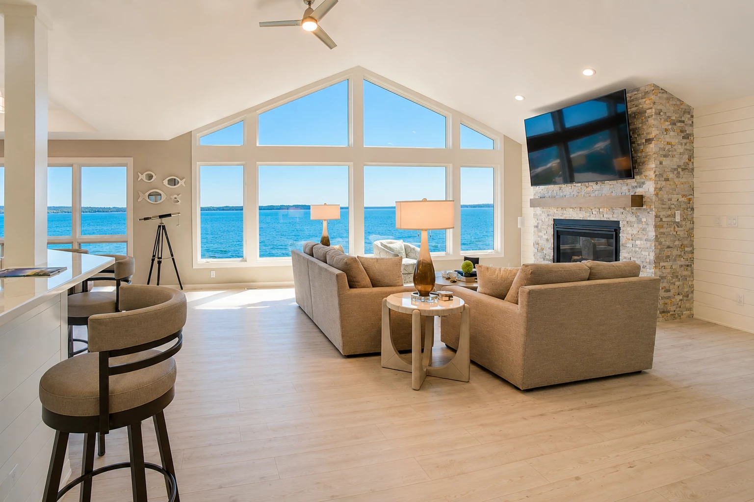 a living room with a fireplace and couches
