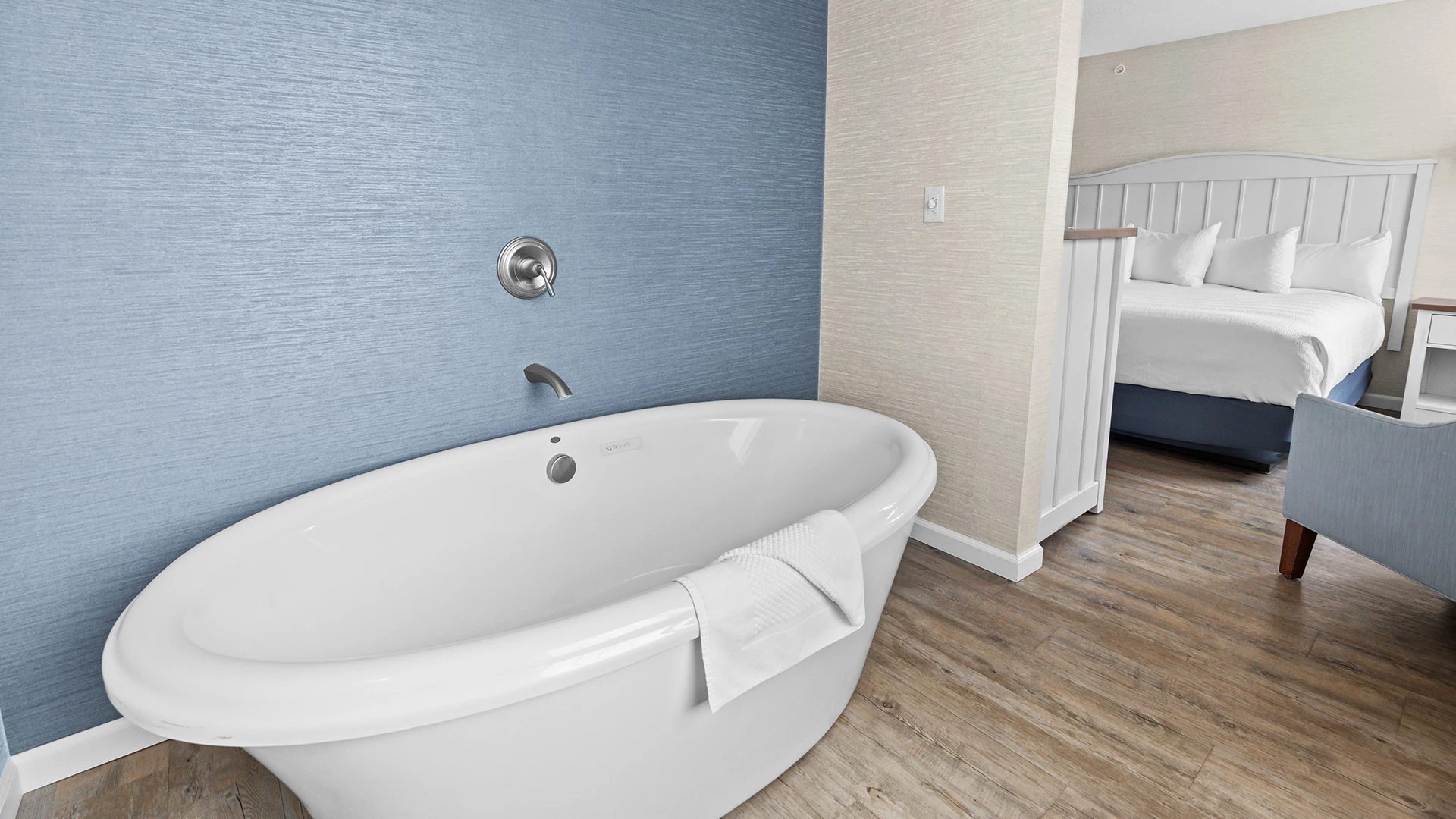 a white bathtub in a bathroom
