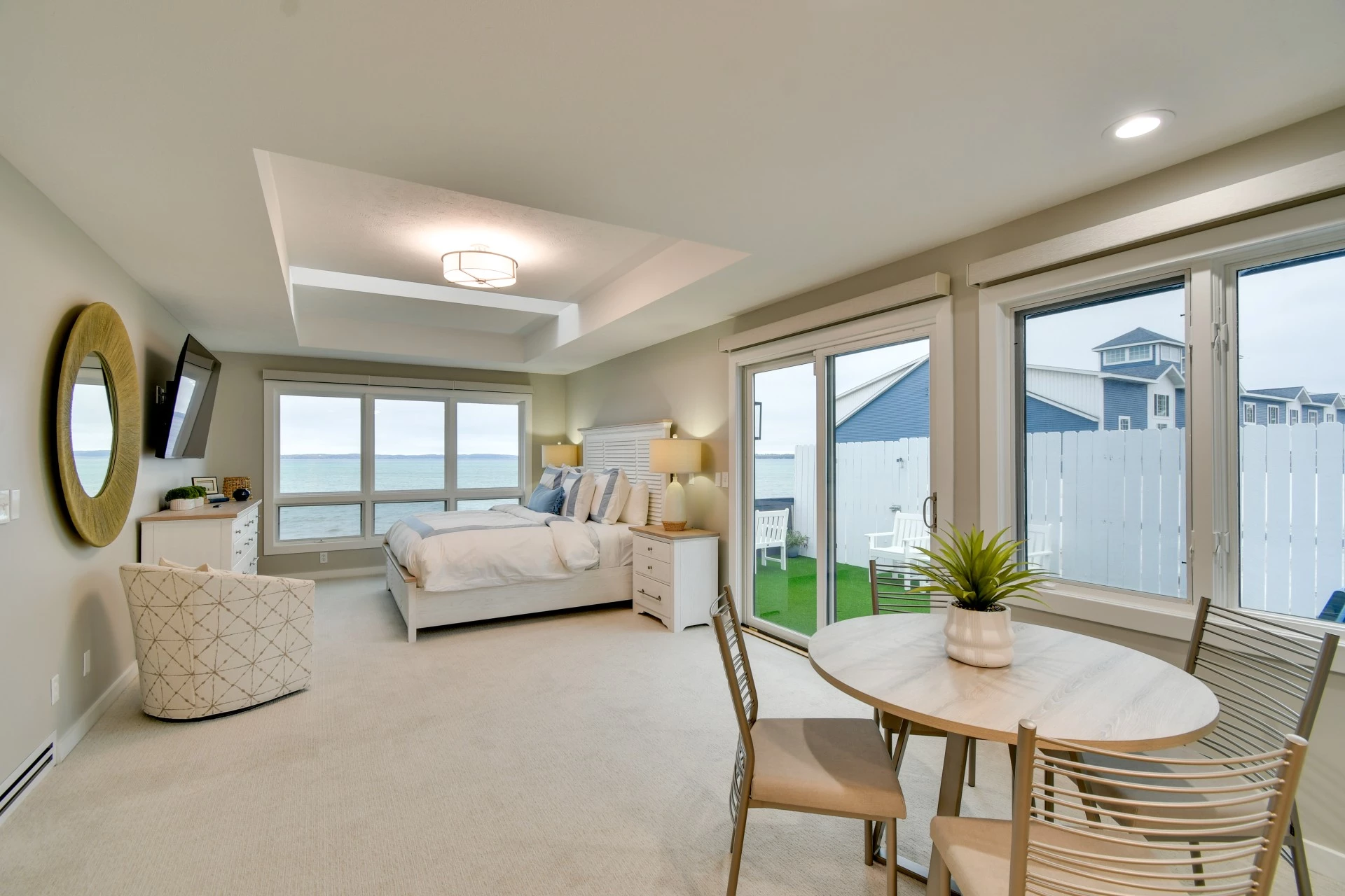 a bedroom with a bed and a table