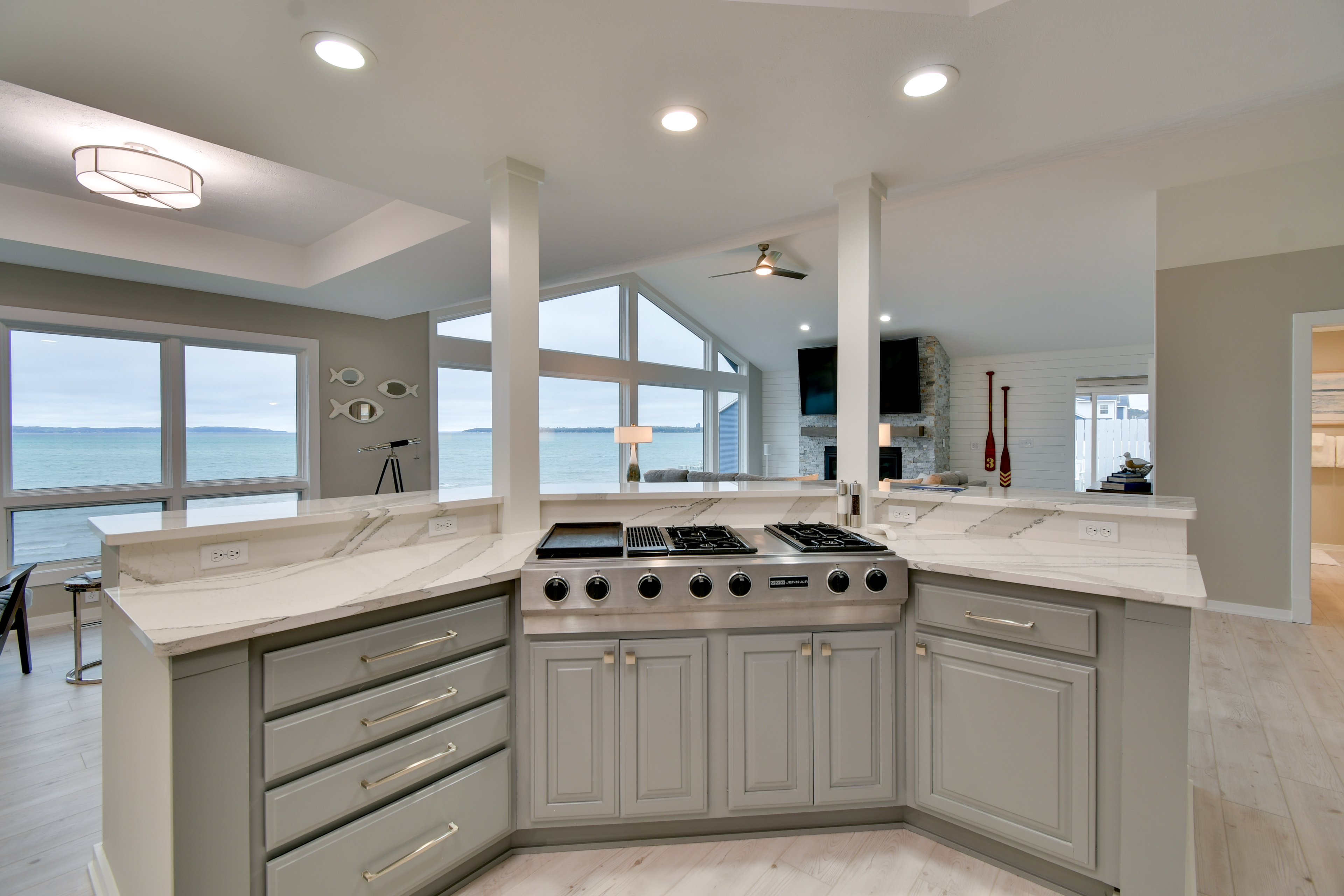 a kitchen with large windows