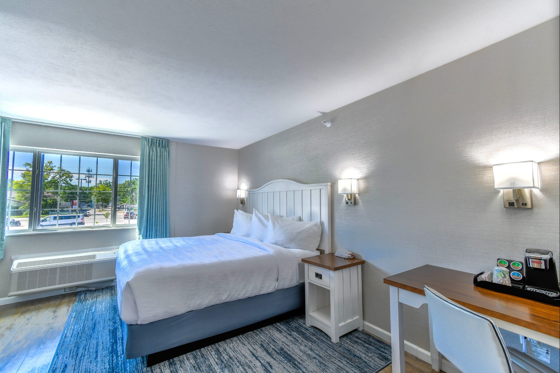 a room with a bed and a table