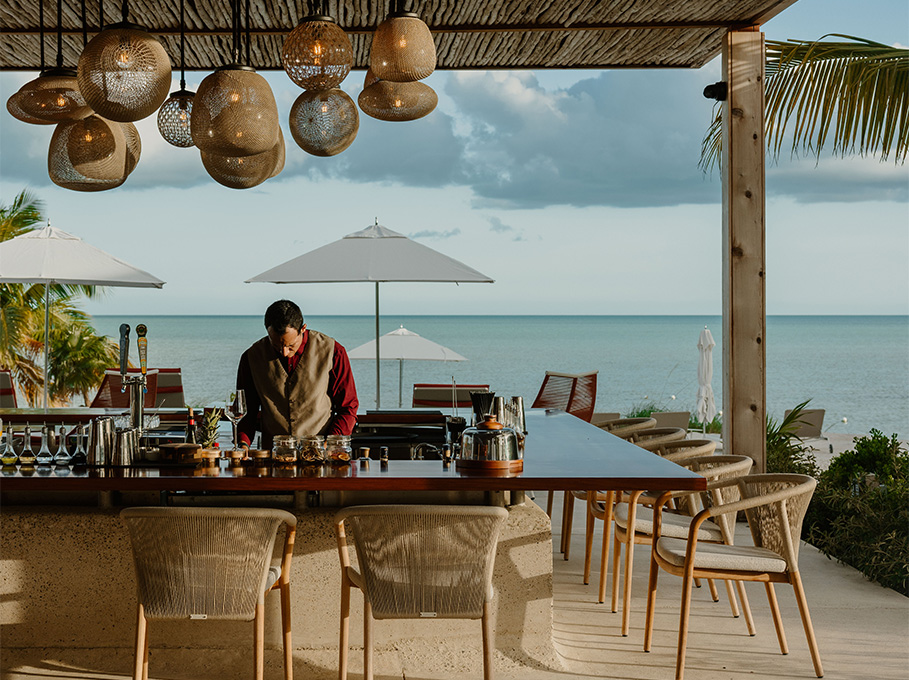 a man standing at a bar