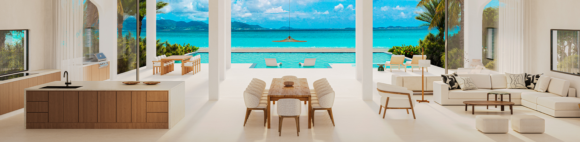 a table and chairs in a room with a view of the ocean