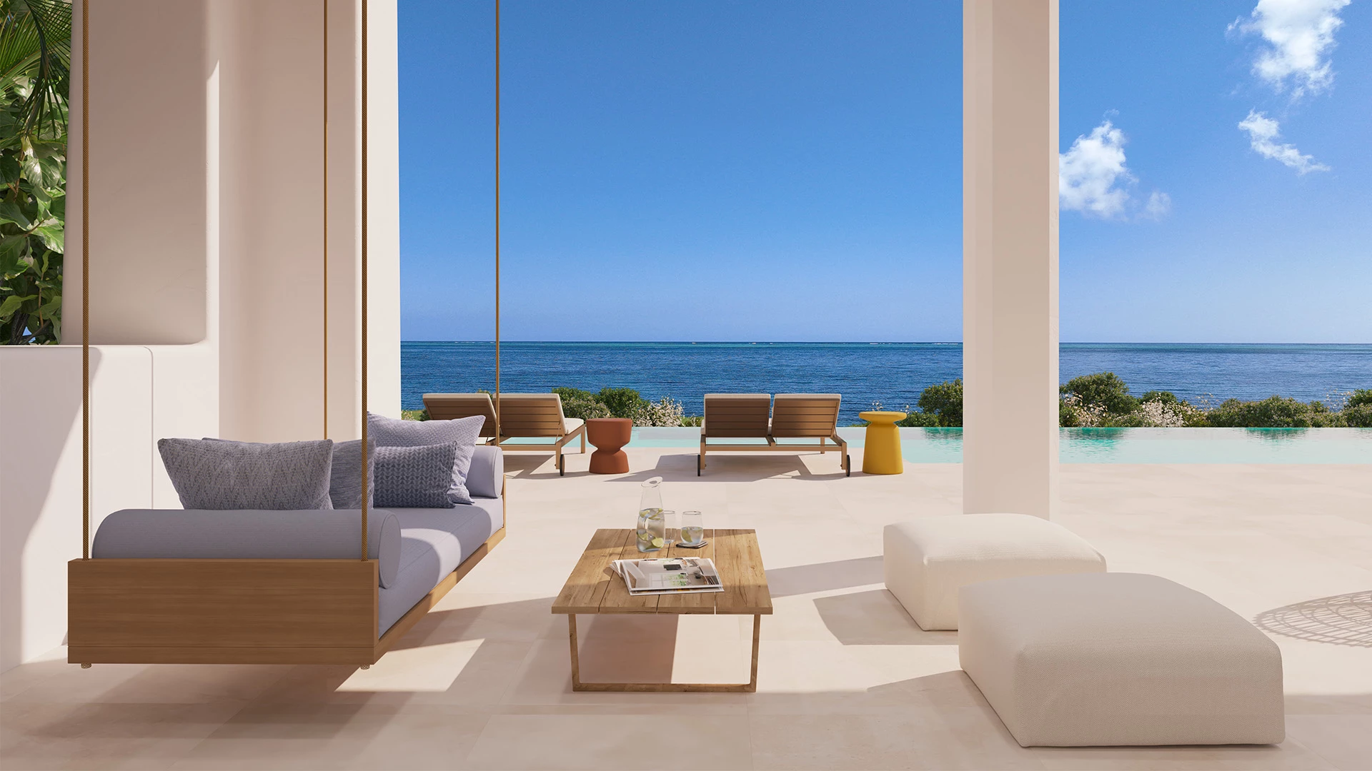 a patio with a view of the ocean