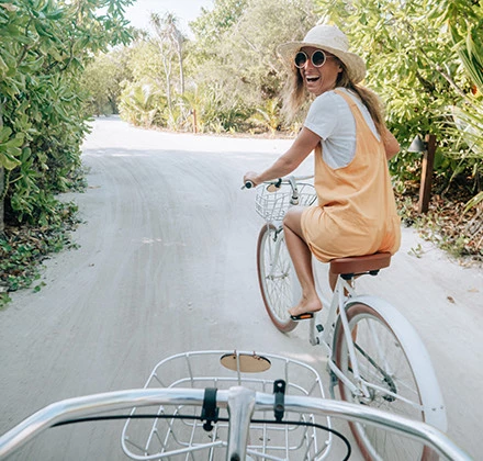 a woman riding a bicycle