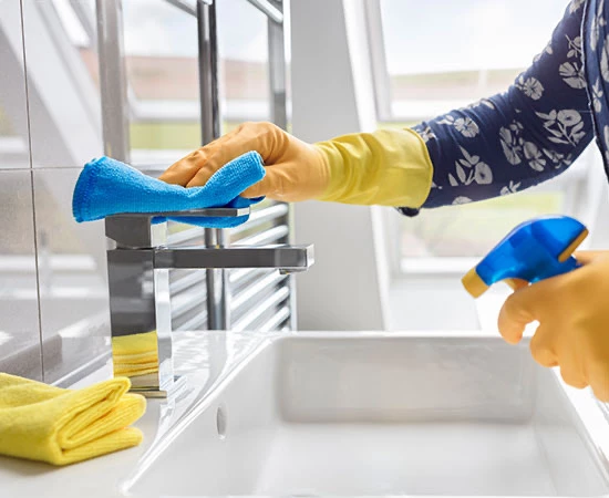 a person in a blue glove