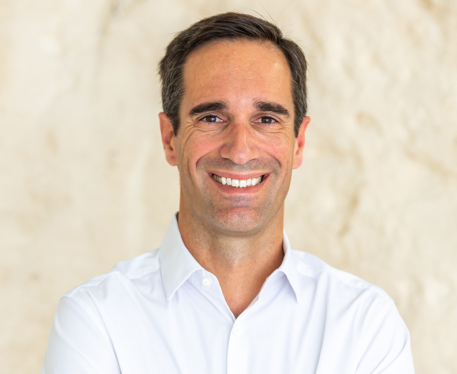 a man smiling for the camera