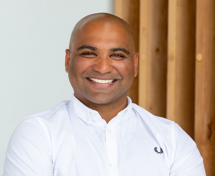 a man smiling for the camera