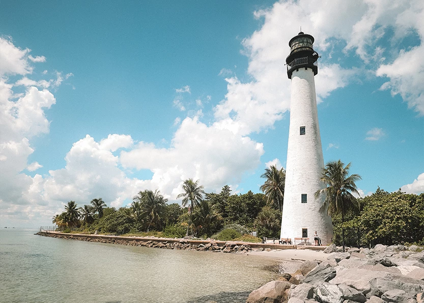 a lighthouse on a beach
