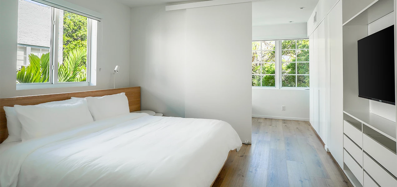 a white bed in a room