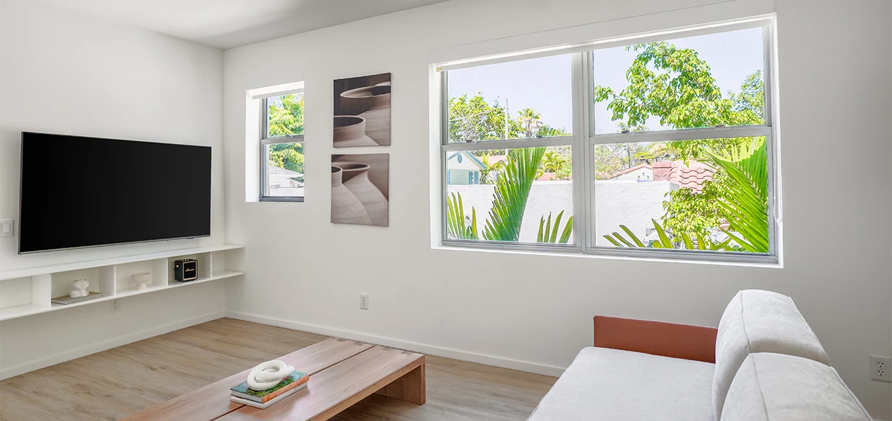 a room with a table and chairs