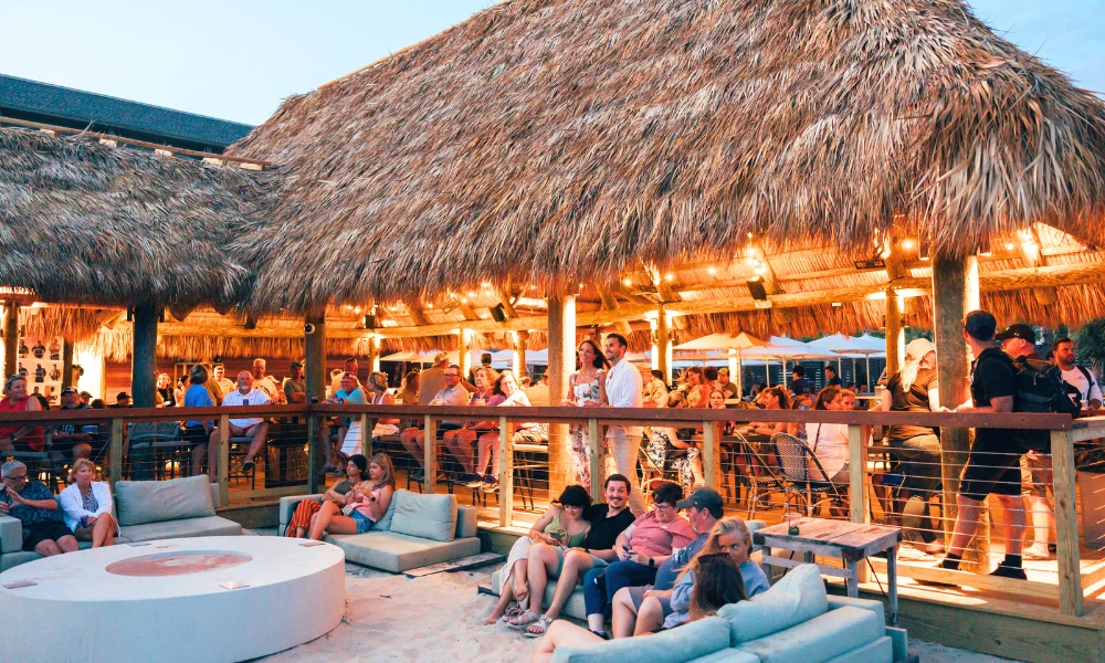 a group of people sitting on a patio