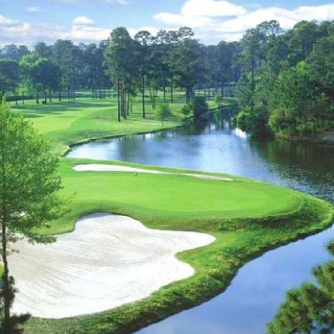 a golf course with a river