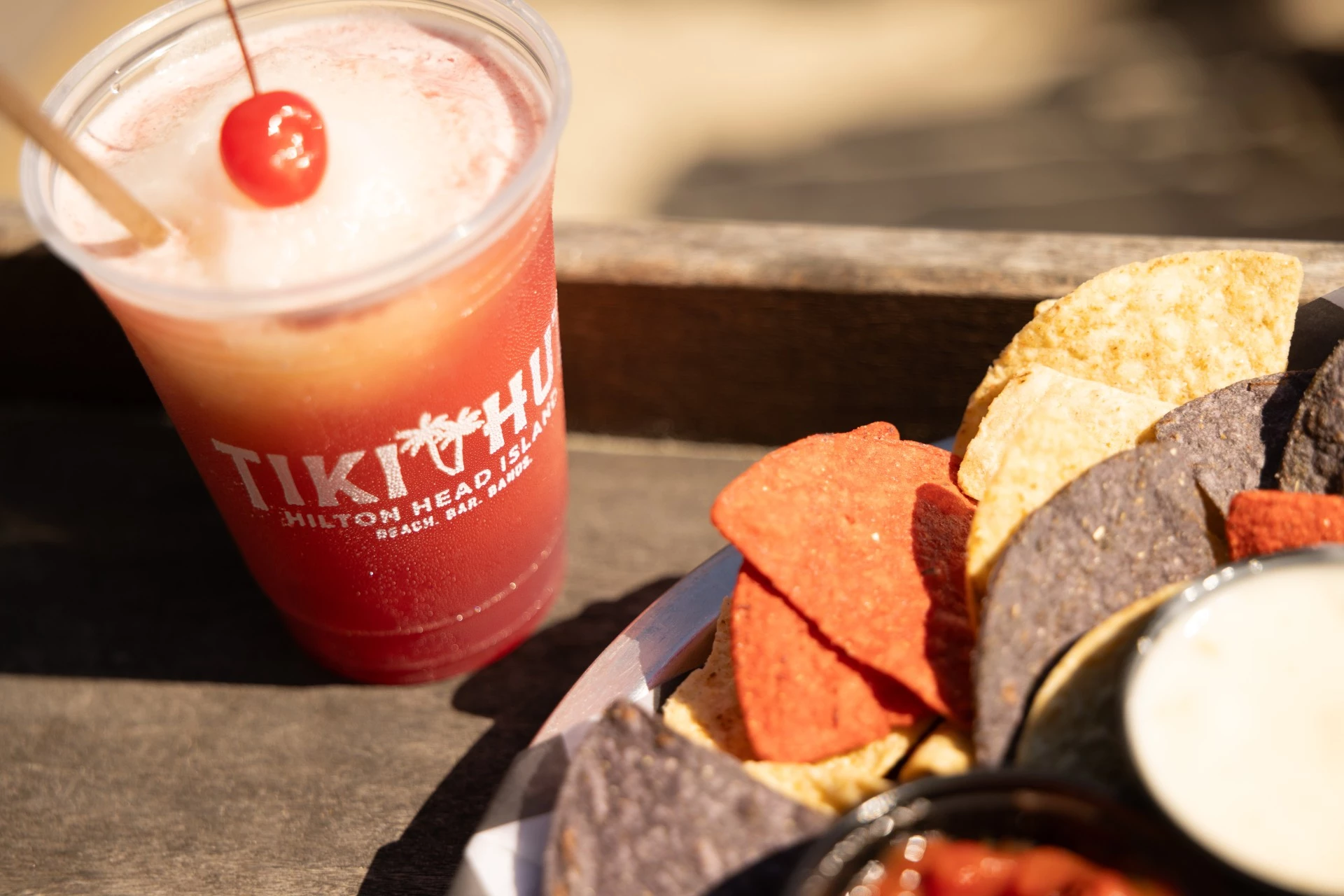 a plate of chips and a drink