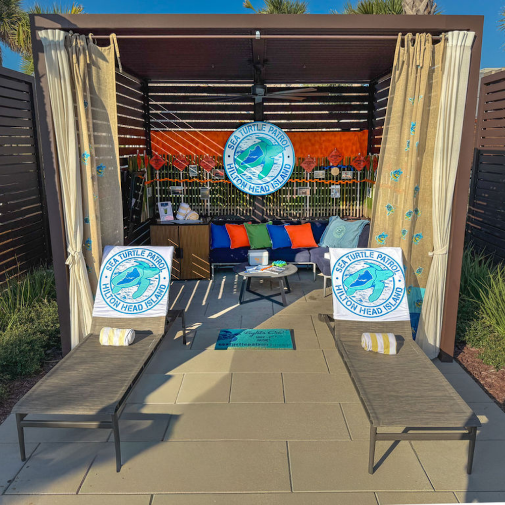 a lounge chairs and a tent