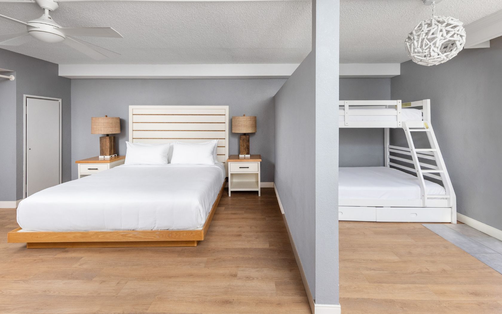 a bedroom with a bed and bunk bed