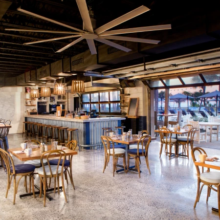 a room with tables and chairs