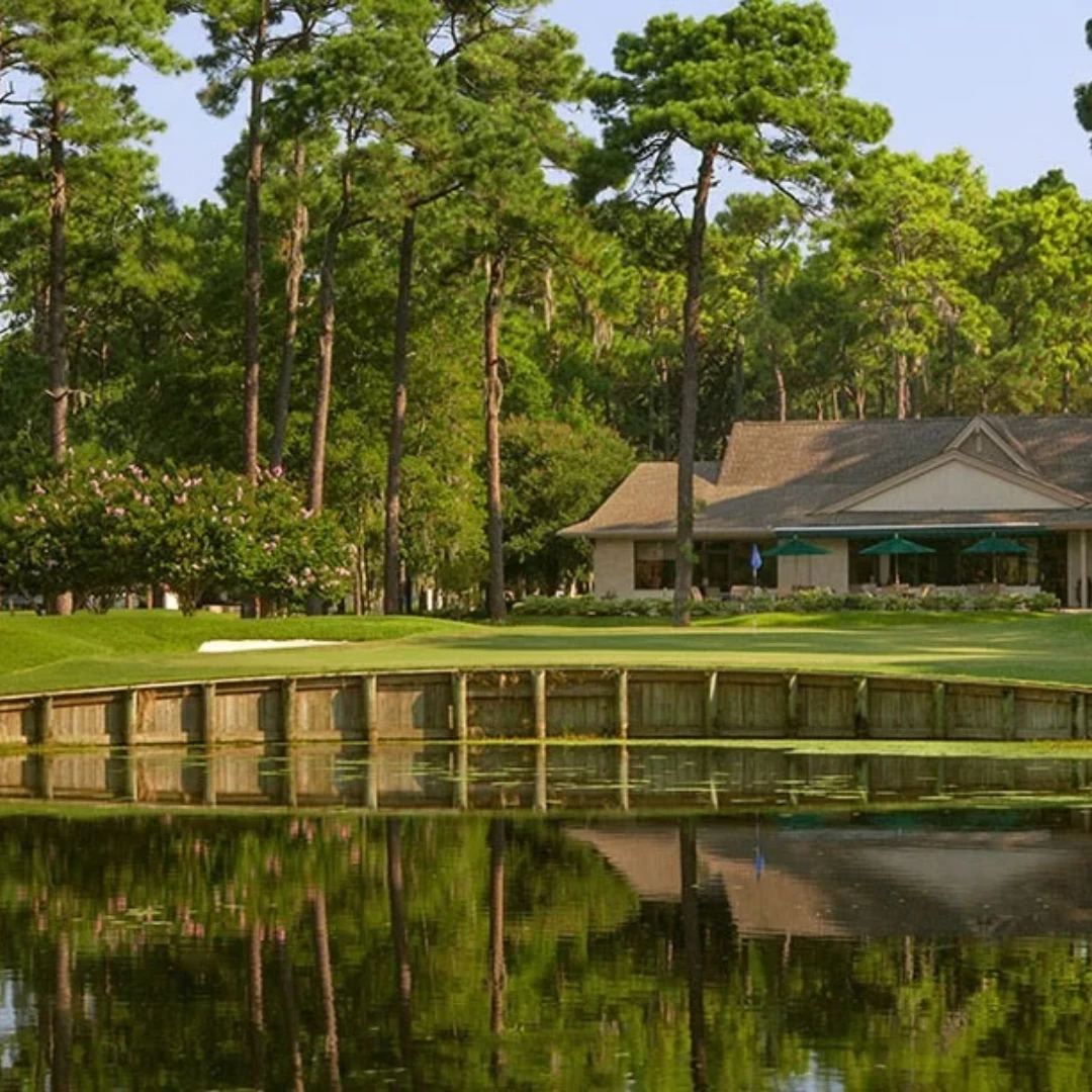 a house with a pond in the middle