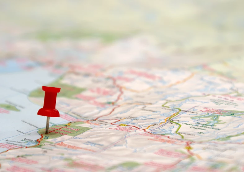 a red push pin on a map