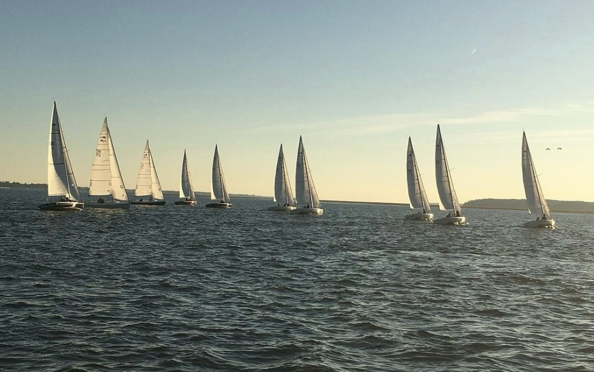 a group of sailboats on water