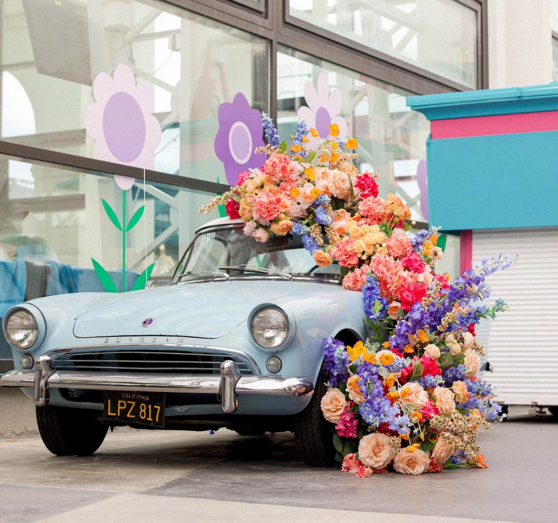 a car with flowers on the hood