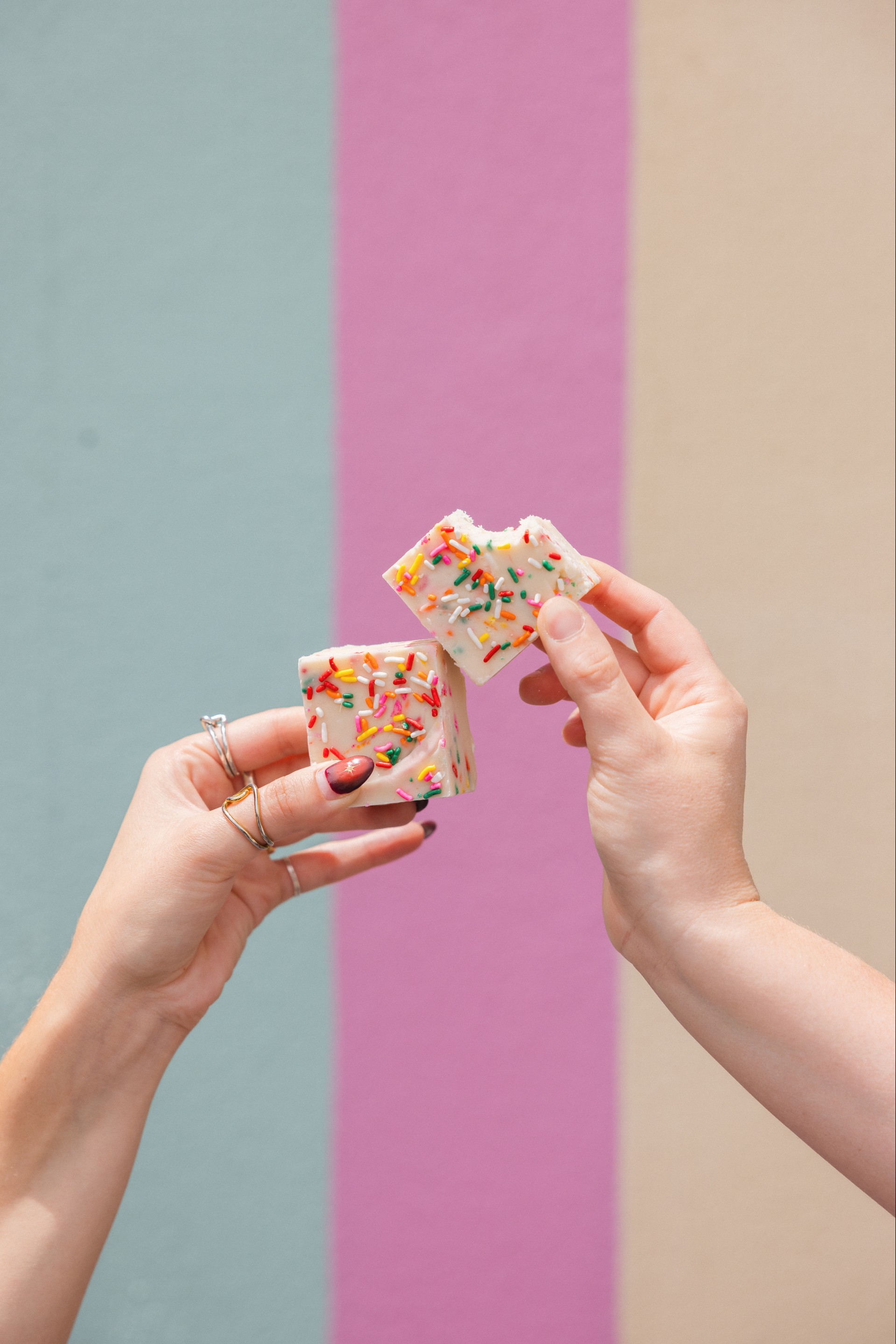 people holding birthday cake fudge