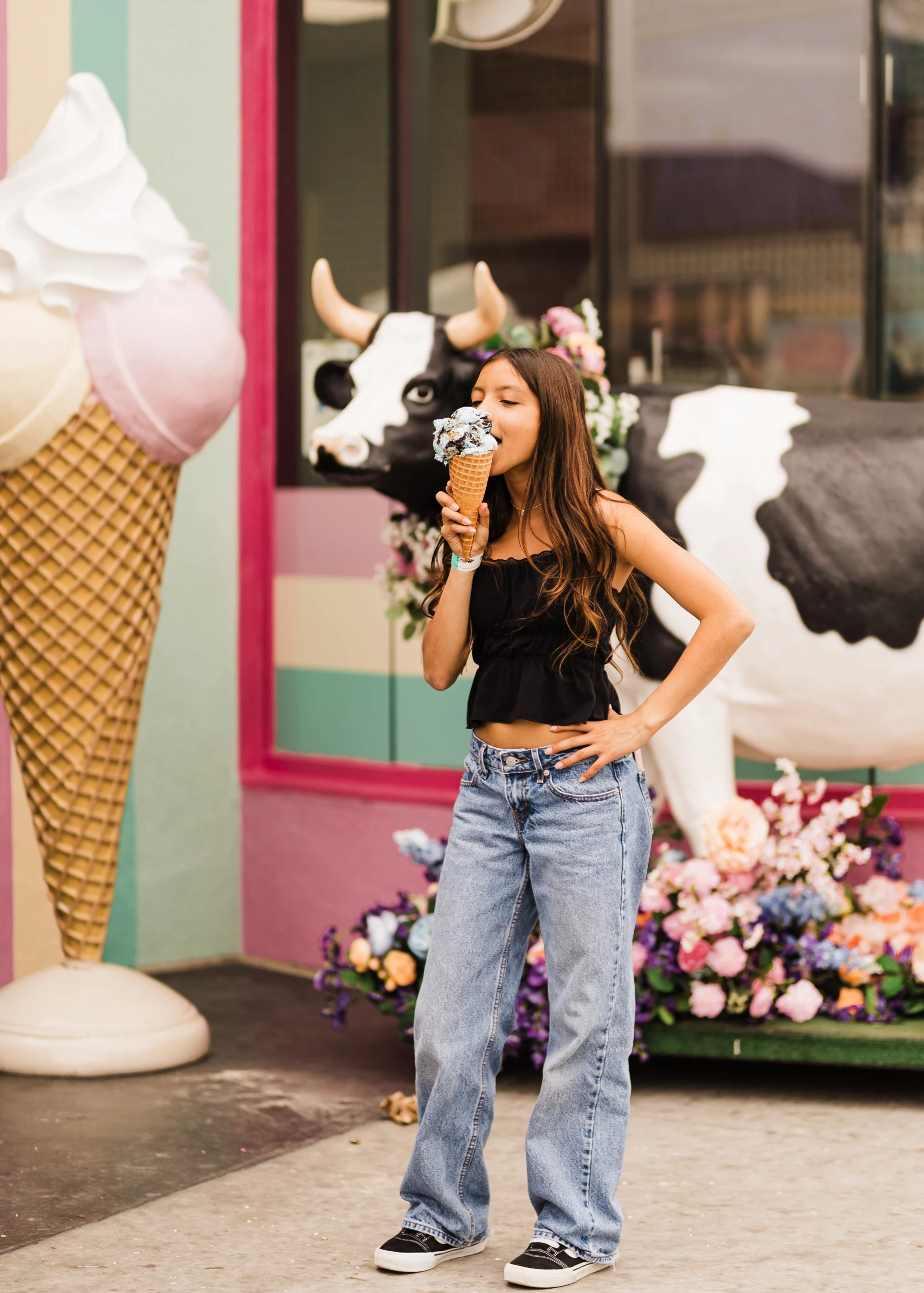 a woman eating an ice cream cone