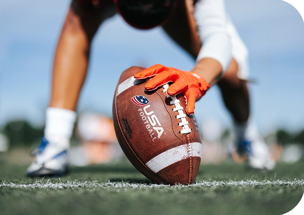 a person holding a football