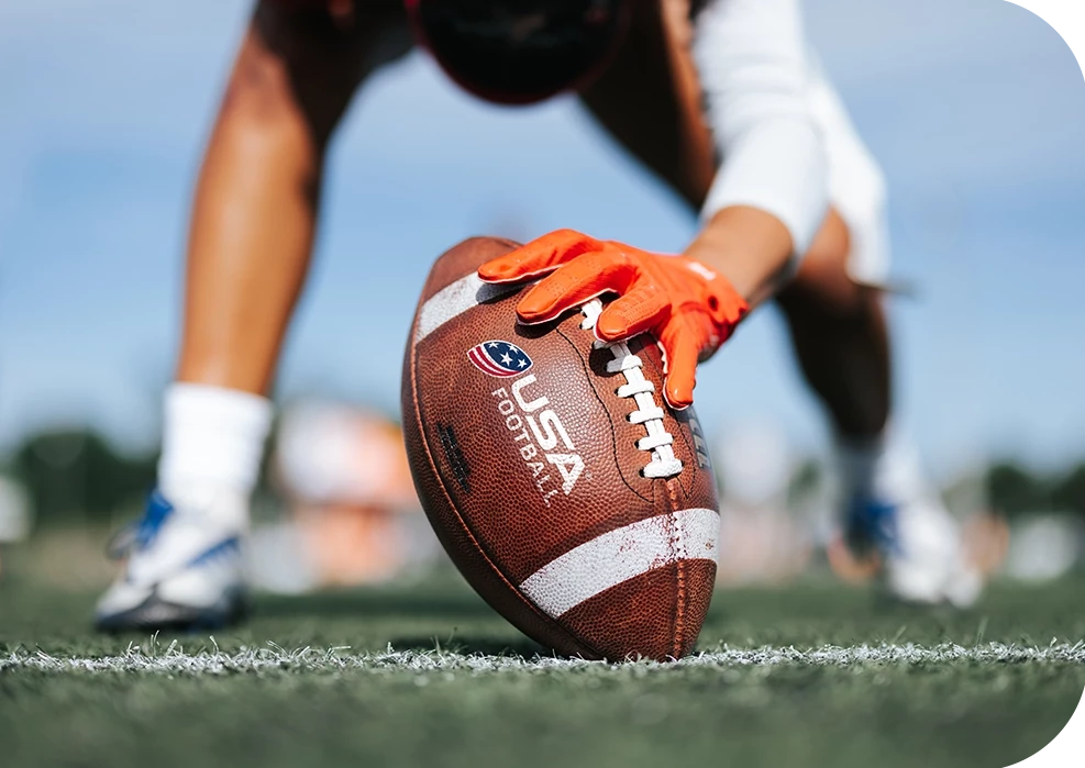 a person holding a football
