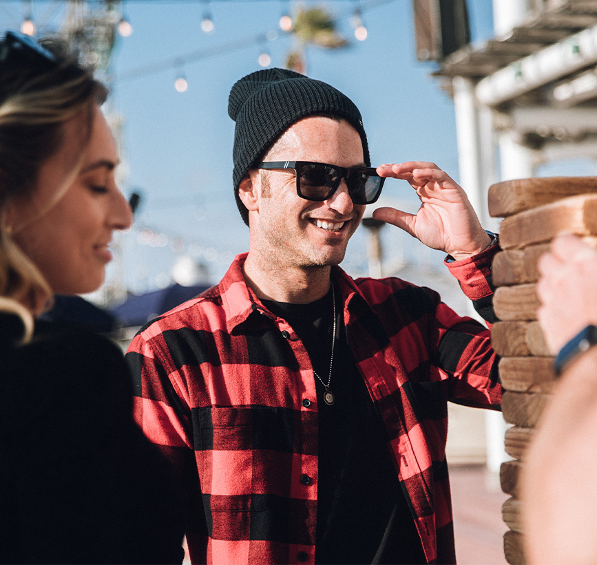 a man wearing sunglasses and a hat