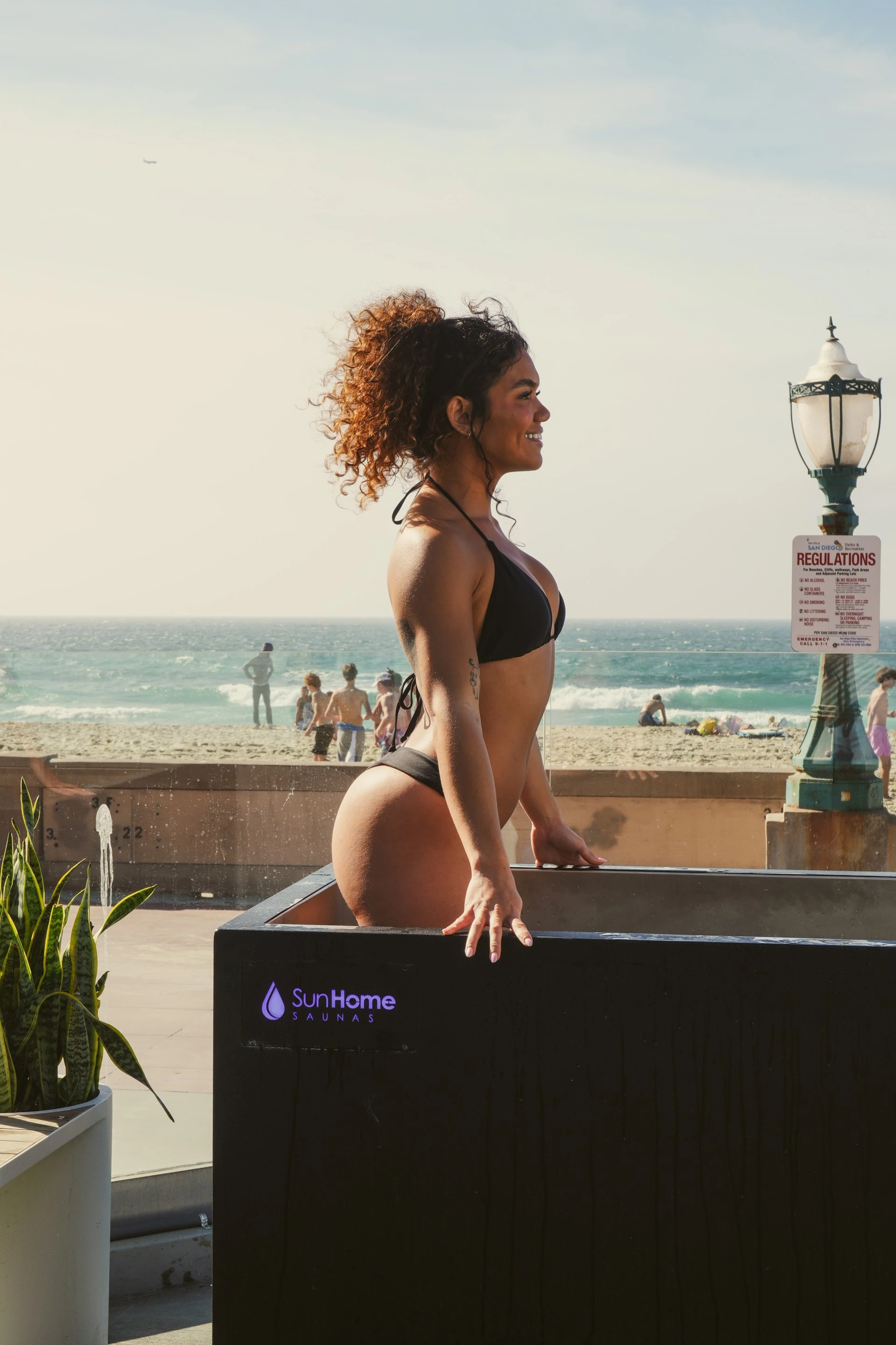 a woman in a swimsuit in a cold plunge