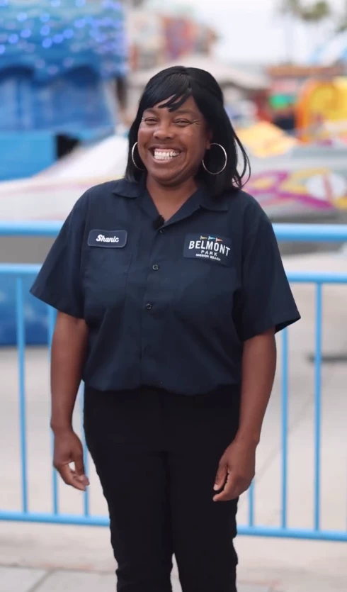 a woman smiling at the camera