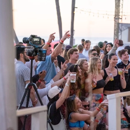 a group of people standing in a crowd