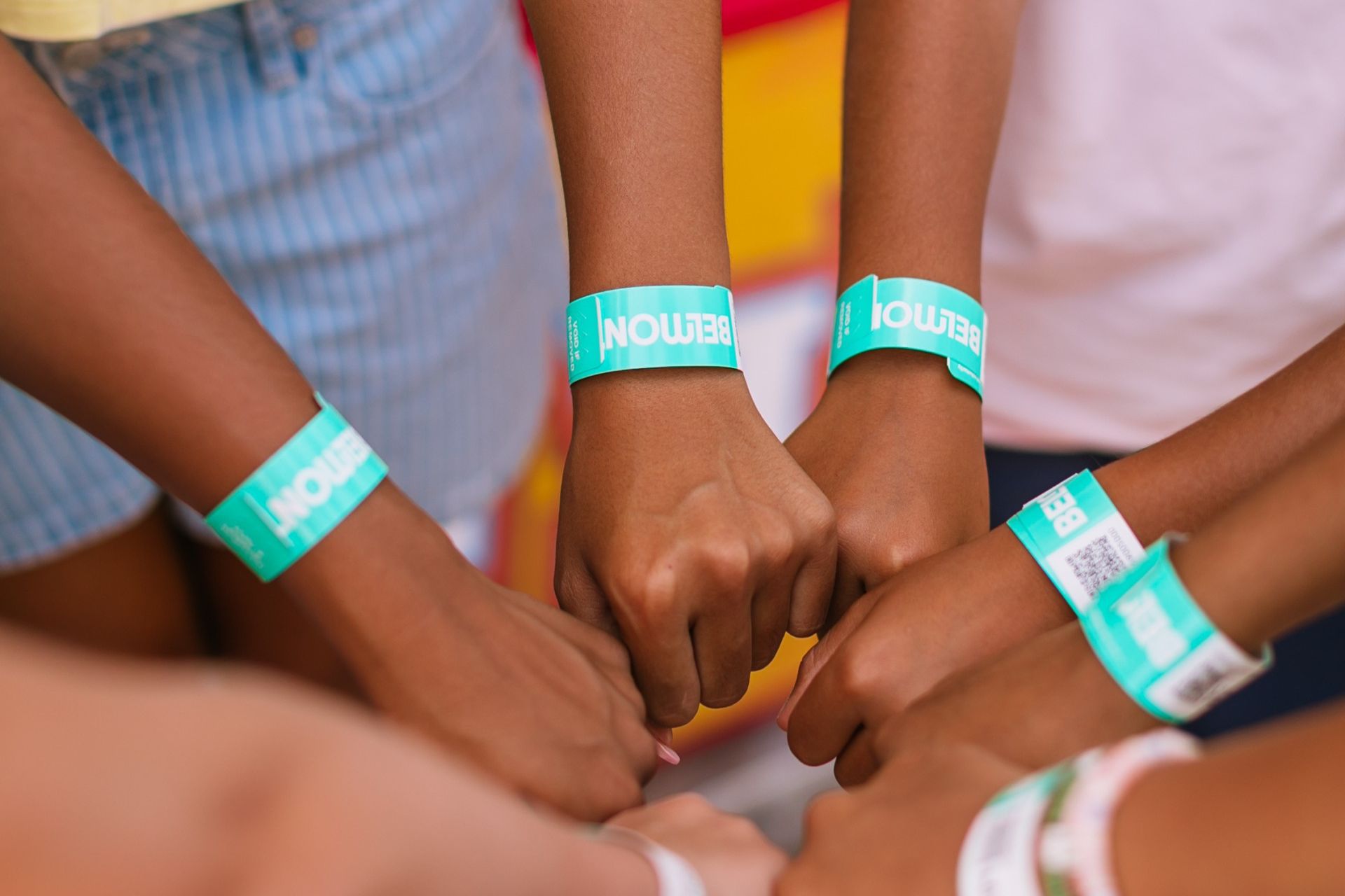 a group of people holding hands