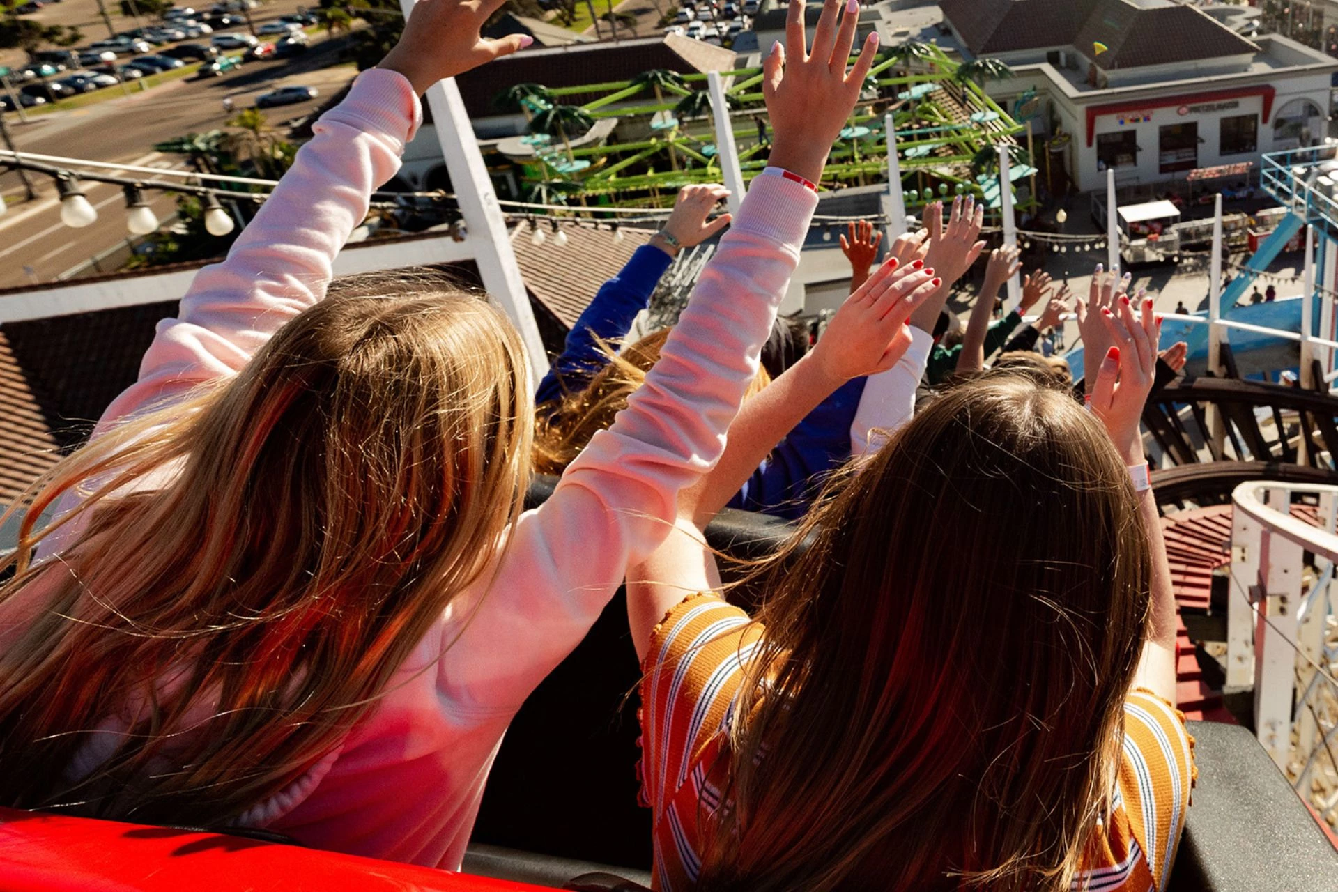 a group of people raising their hands