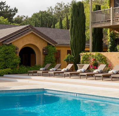 a pool next to a building