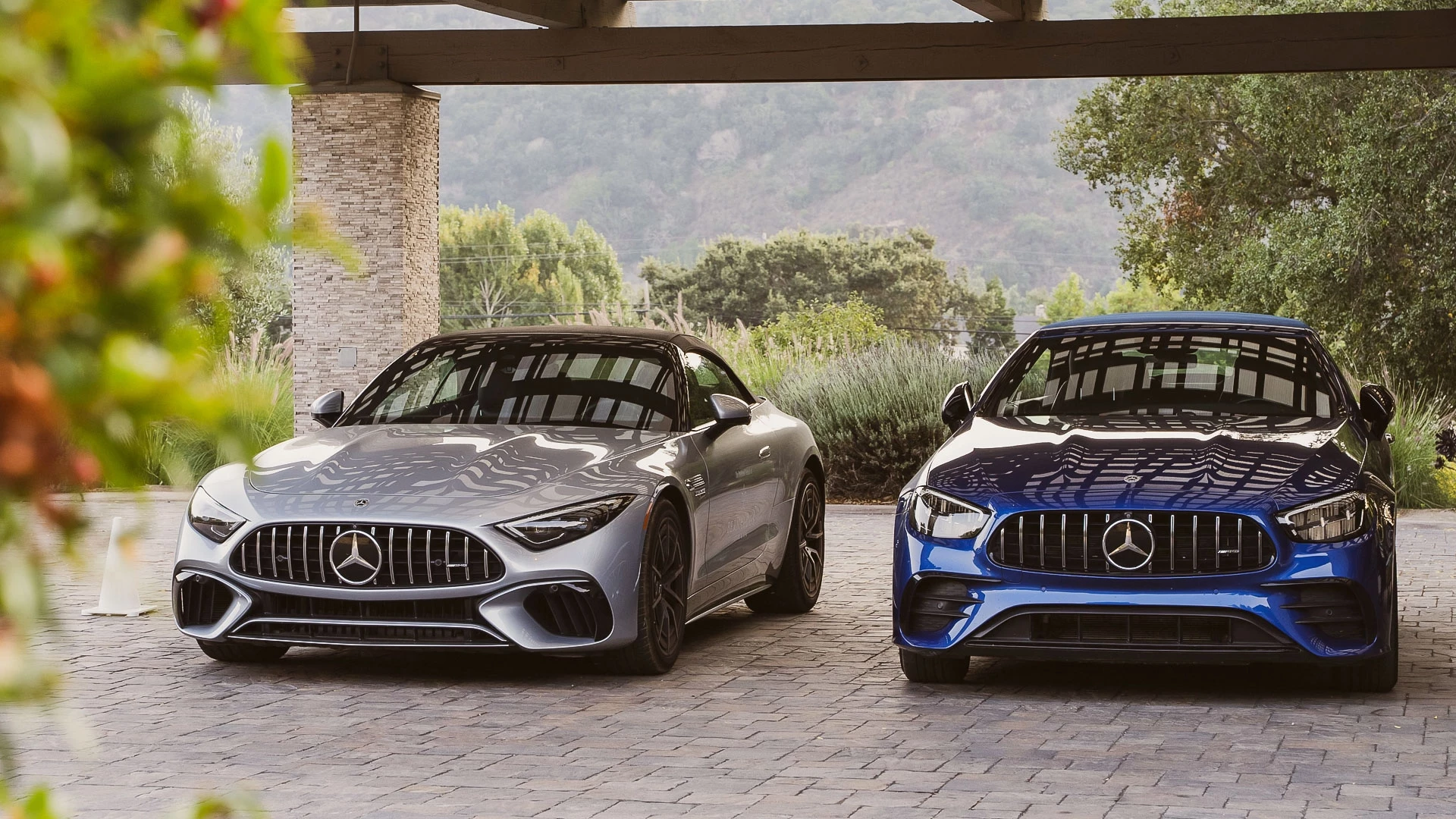 two cars parked under a roof