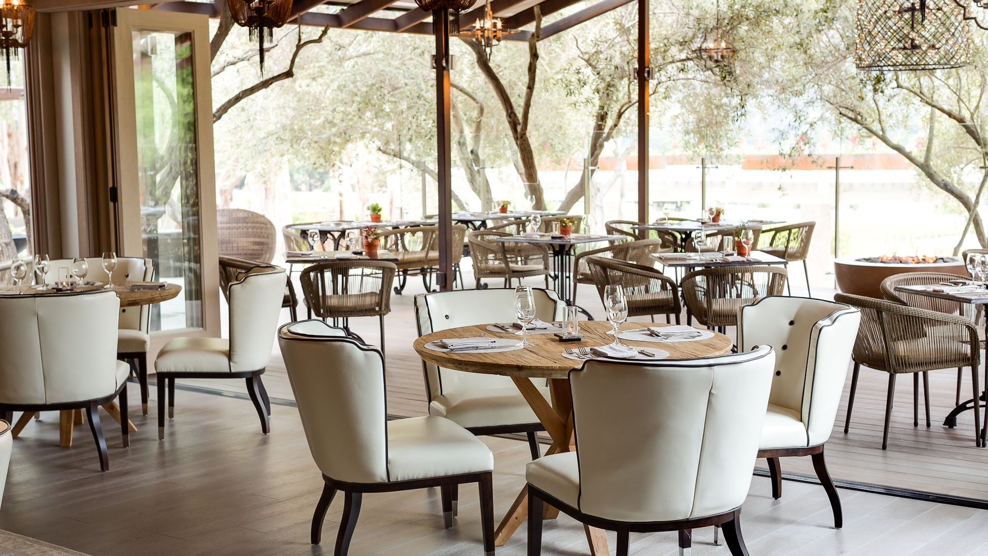 a restaurant with tables and chairs
