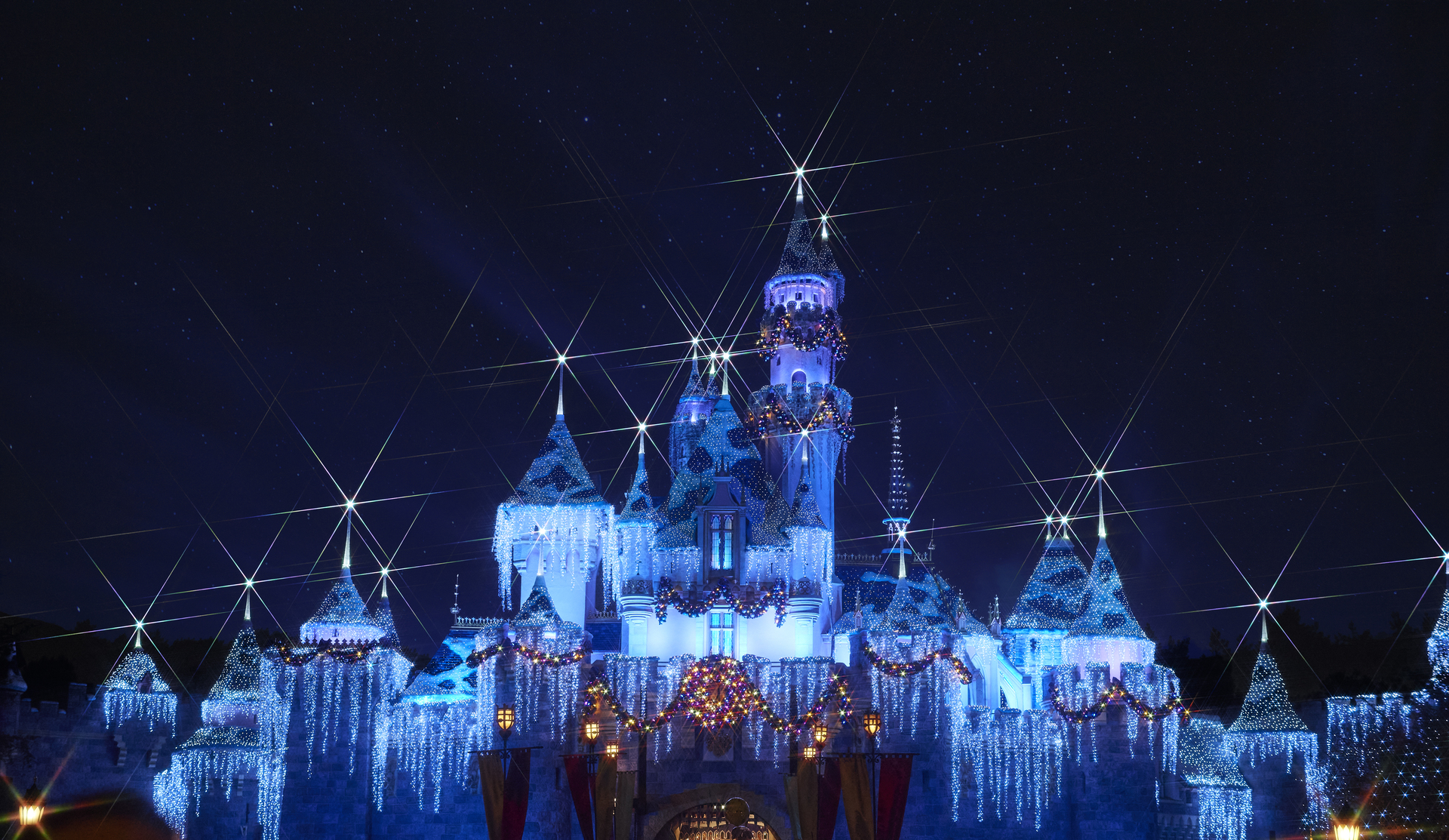 a castle with lights and stars