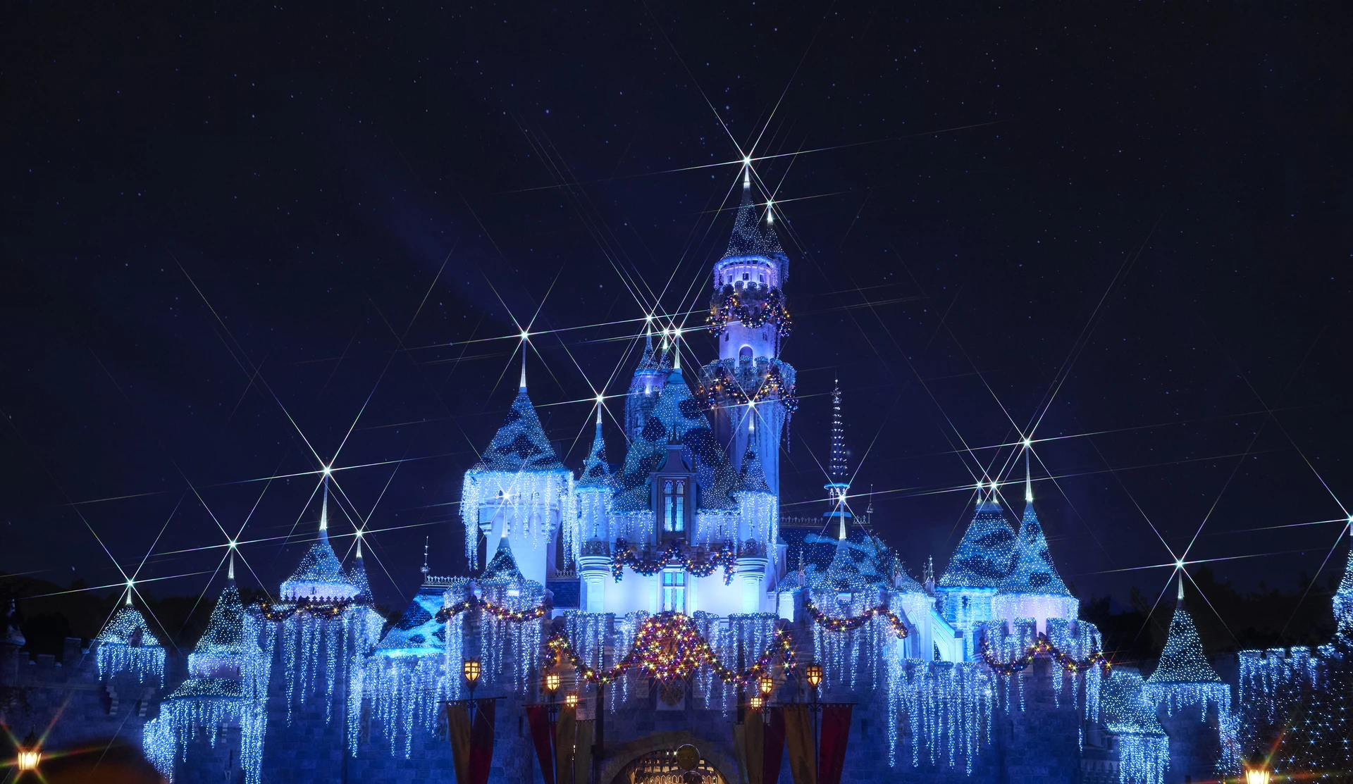 a castle with lights and stars