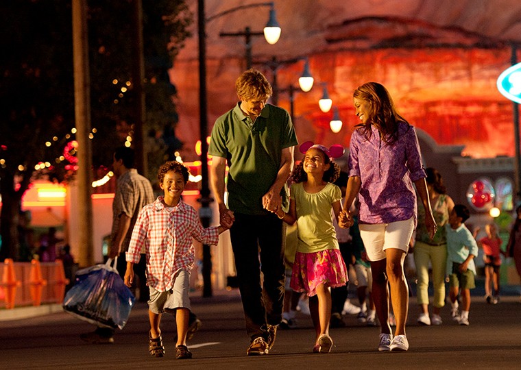 parents and kids walking hand in hand