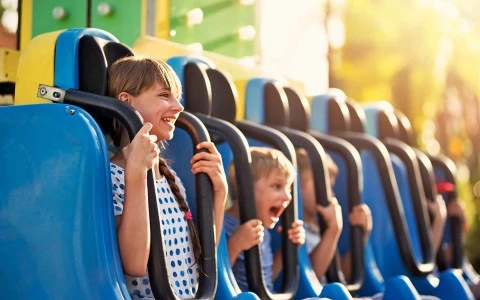 little kids on a rollercoaster 